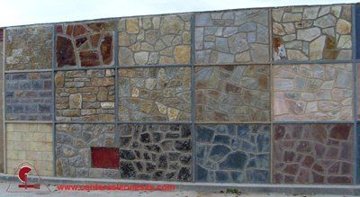 exposicion de tipos de piedra en exterior de almacen