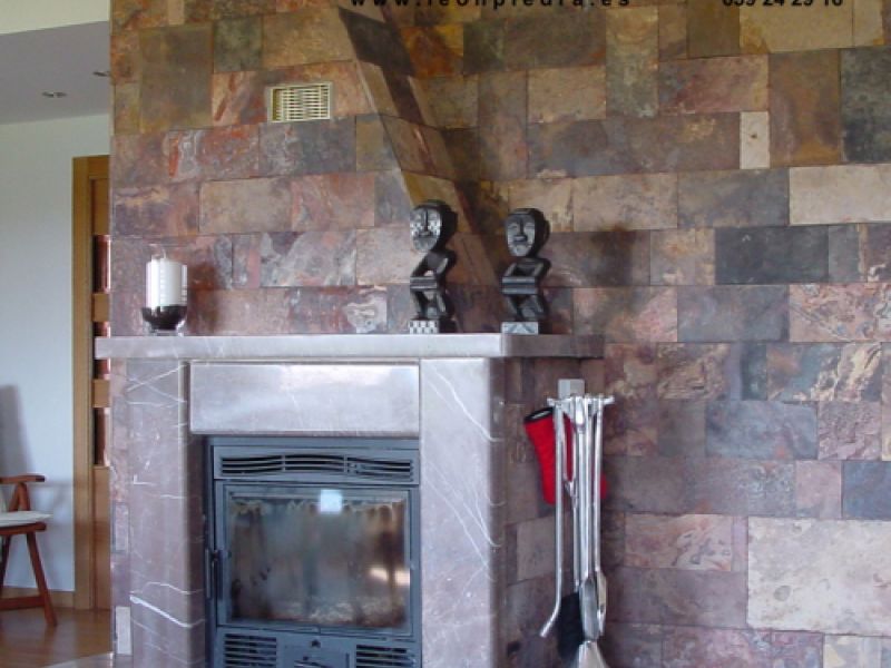 Conjunto de chimenea y pared vivienda